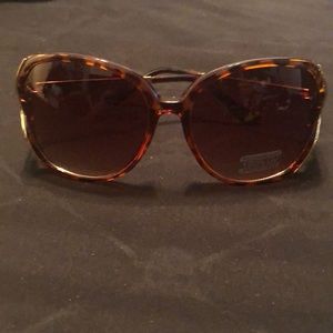 Brown and gold frame sunglasses